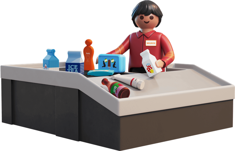 Kassierer:in an einer Playmobil-Migros-Kassenzone